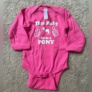 This baby needs a pony onesie